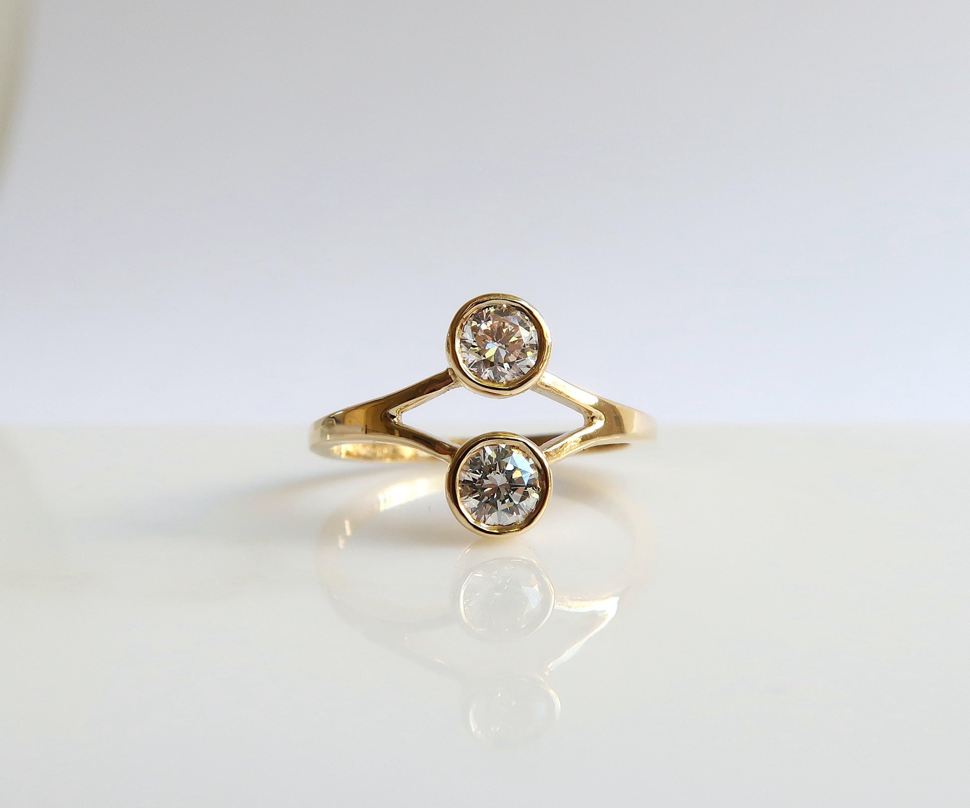 Nishi bezel set yellow gold diamond ring