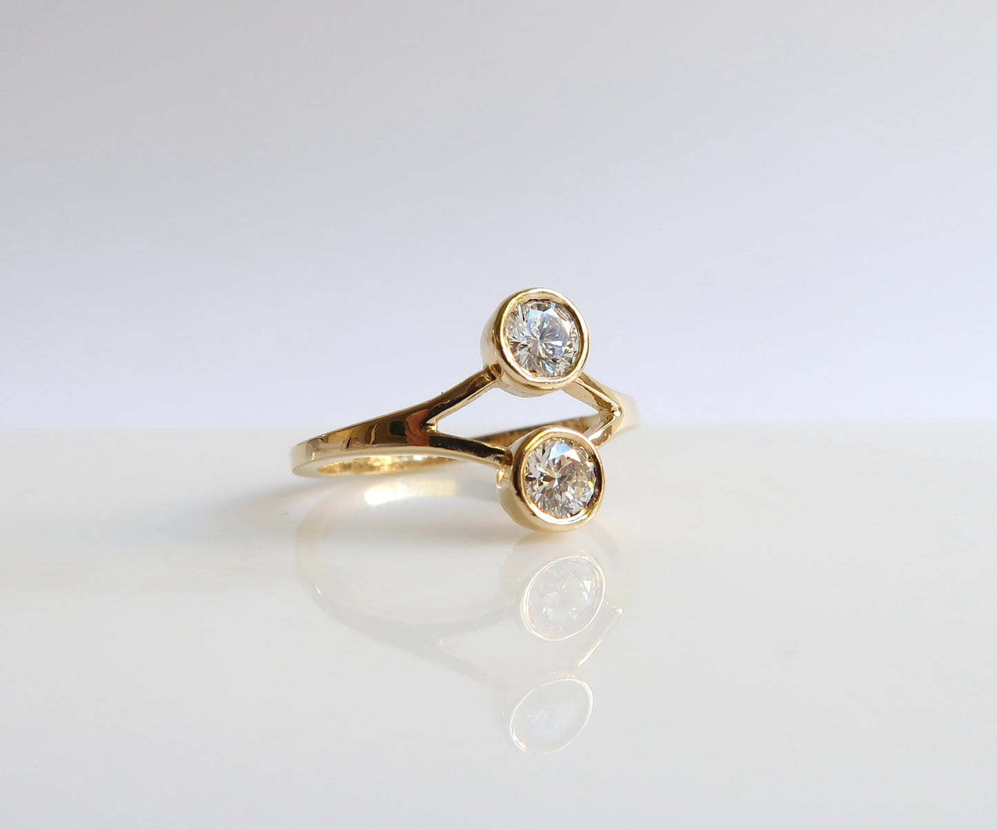 Nishi bezel set yellow gold diamond ring